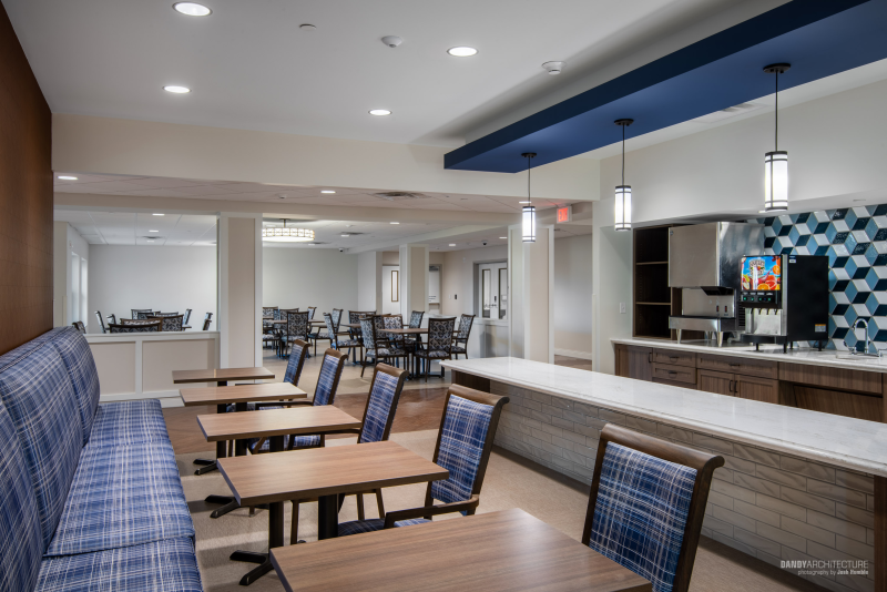 Cafeteria interior of senior living facility.
